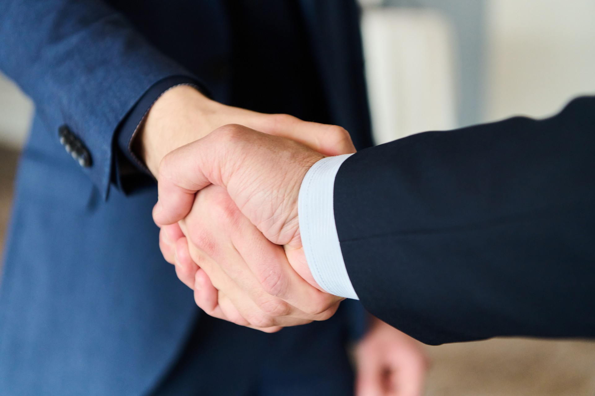 Businessmen making handshake with partner, greeting, dealing, merger and acquisition, business joint venture concept, for business, finance and investment background, teamwork and successful business